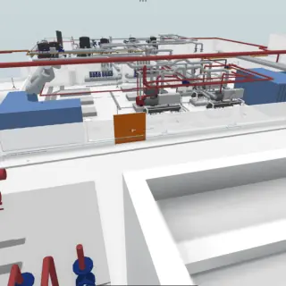 Technische Anlage mit Rohrleitungen und Funktionsbereichen in einem Gebäude.